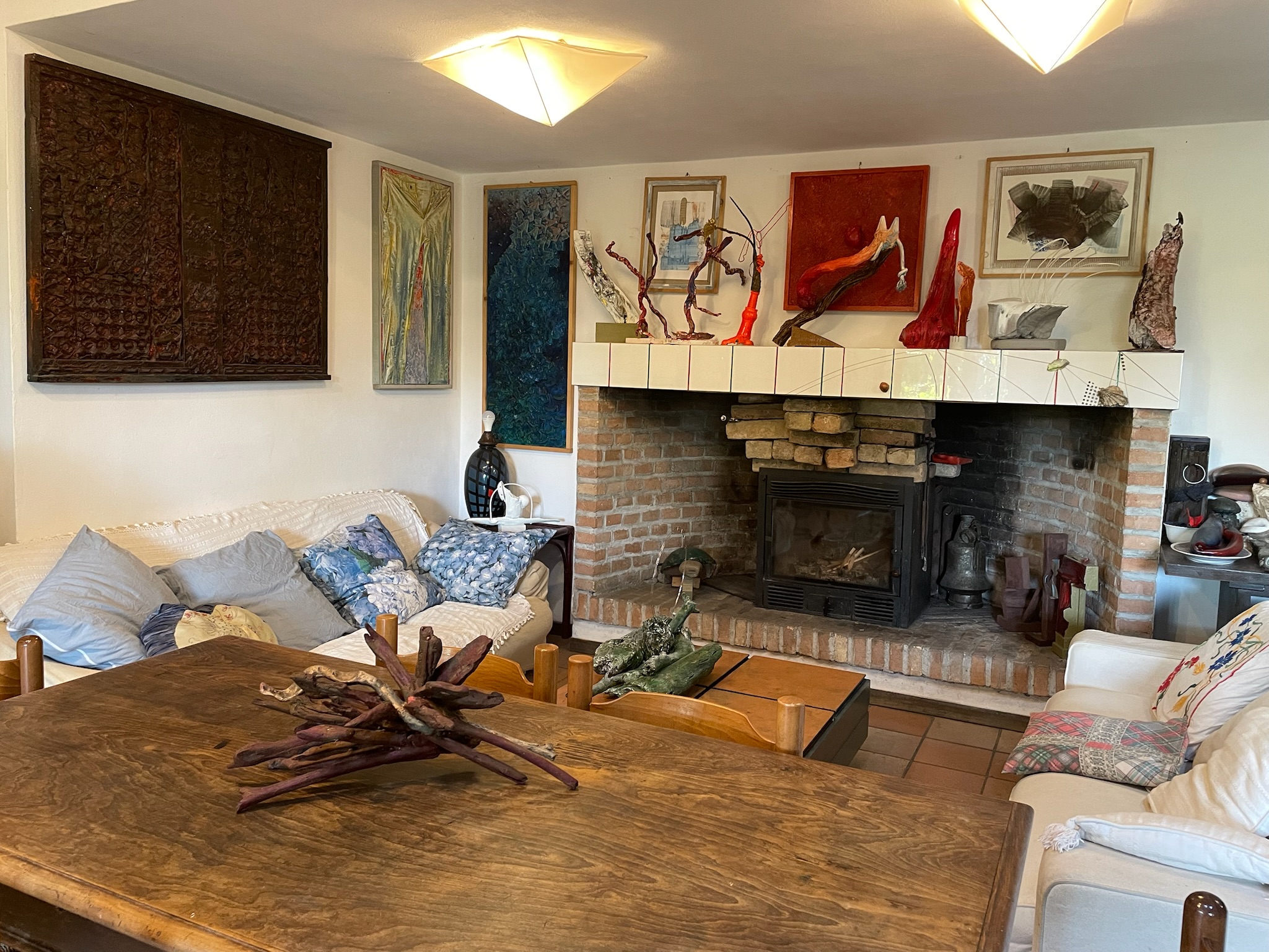 Montico House 13 - Living room - fireplace and art in a domestic setting